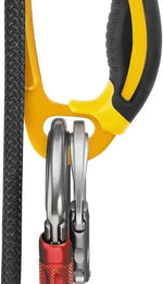 Yellow PETZL Ascension Ascender right-hand ergonomic rope climbing device with dual-density handle and toothed cam